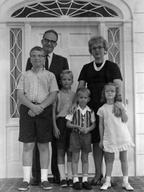 President Whiddon with wife and children on front porch.
